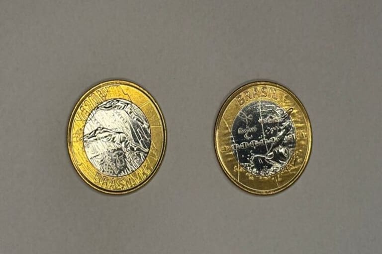 Moedas de 1 real de natação das olimpíadas