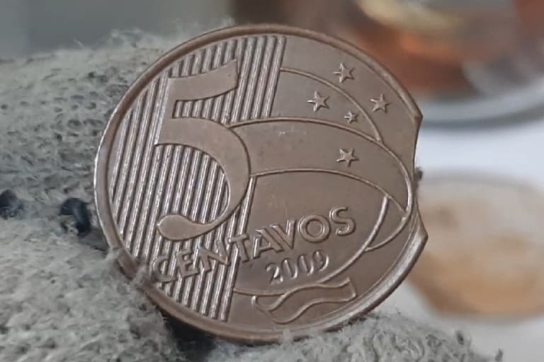 Moeda 5 centavos com disco cortado